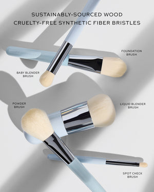Set of makeup brushes with brush names on a gray background