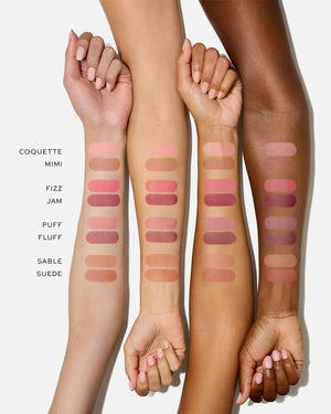 Color swatches on arms with labeled makeup names