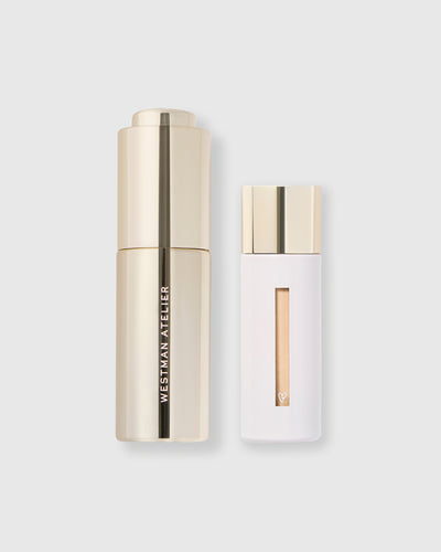 Eye Activator and Vital Skincare Concealer against a grey background.

