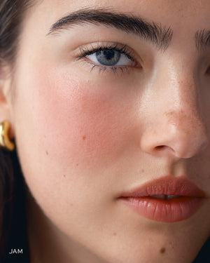 Close-up of a model's face wearing Baby Cheeks. 