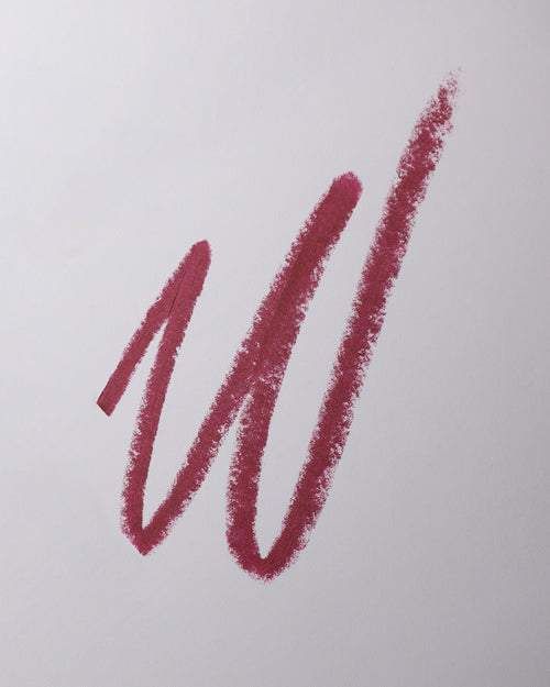 Lip liner swatch in Lou Lou on grey background.