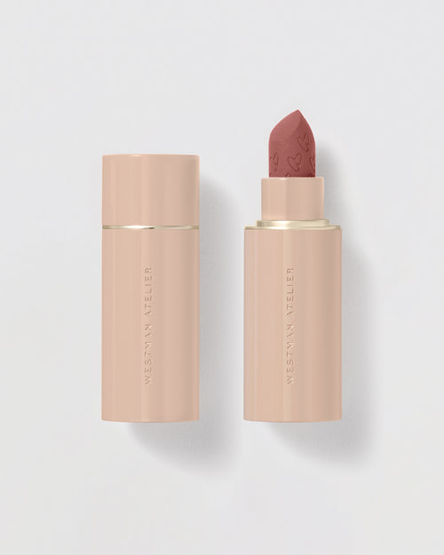 Lipstick on grey background.