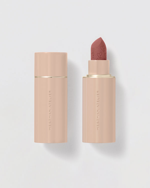 Lipstick on grey background.