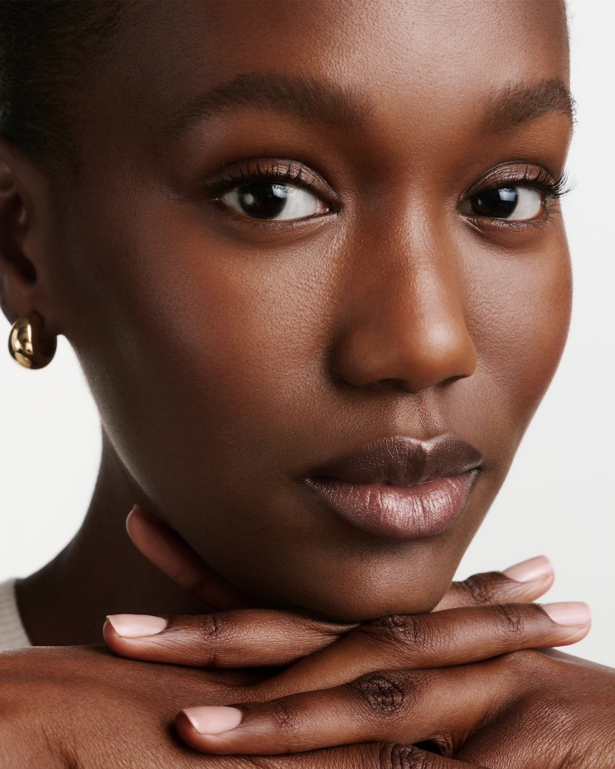 Model wearing HydroBalm in Nectar.