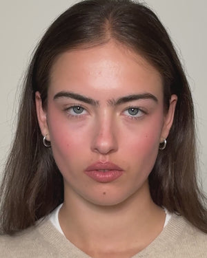 Model applies products featured in the Petite Petal Edition set.