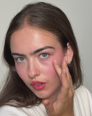 Model applies Baby Cheeks. 